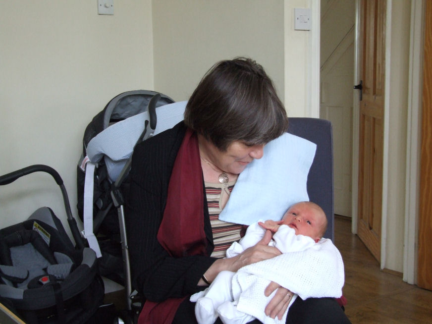 Alexander Frederick (Alex) in the arms of his grandmother, Rhian