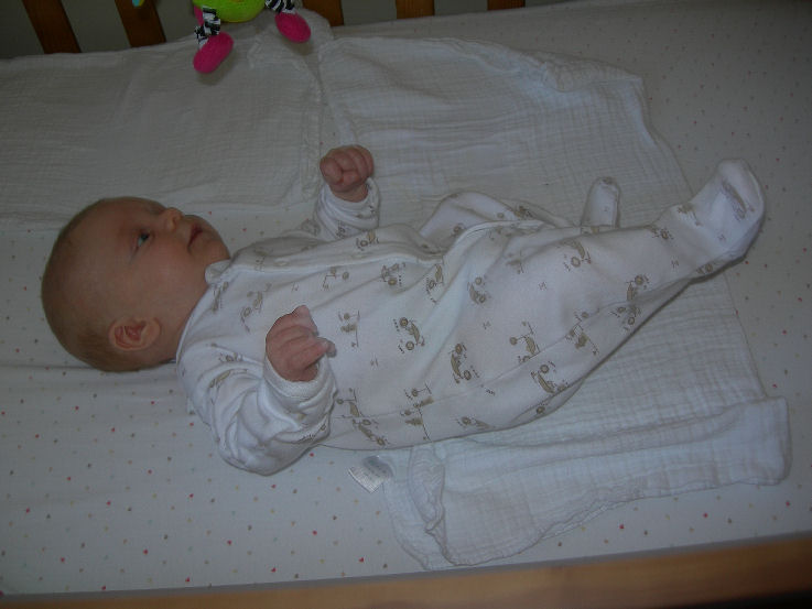 Alexander Frederick (Alex) at 8 weeks in his cot