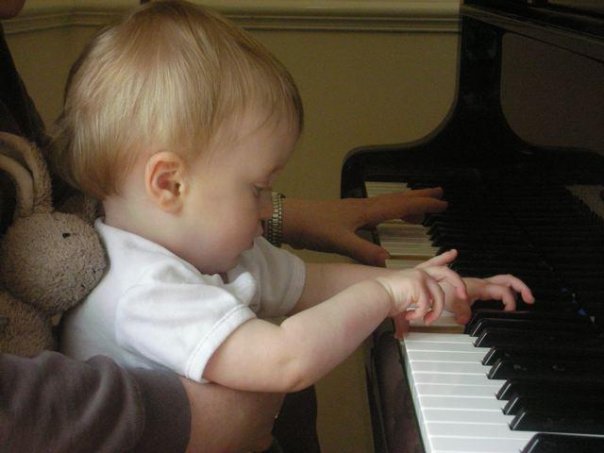 Alexander Frederick (Alex) at the piano